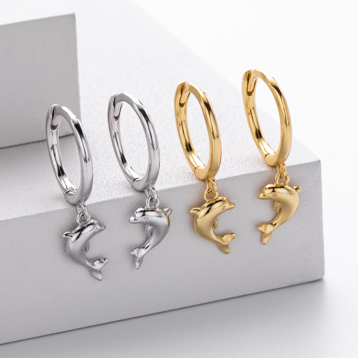 Sterling silver dolphin hoops
