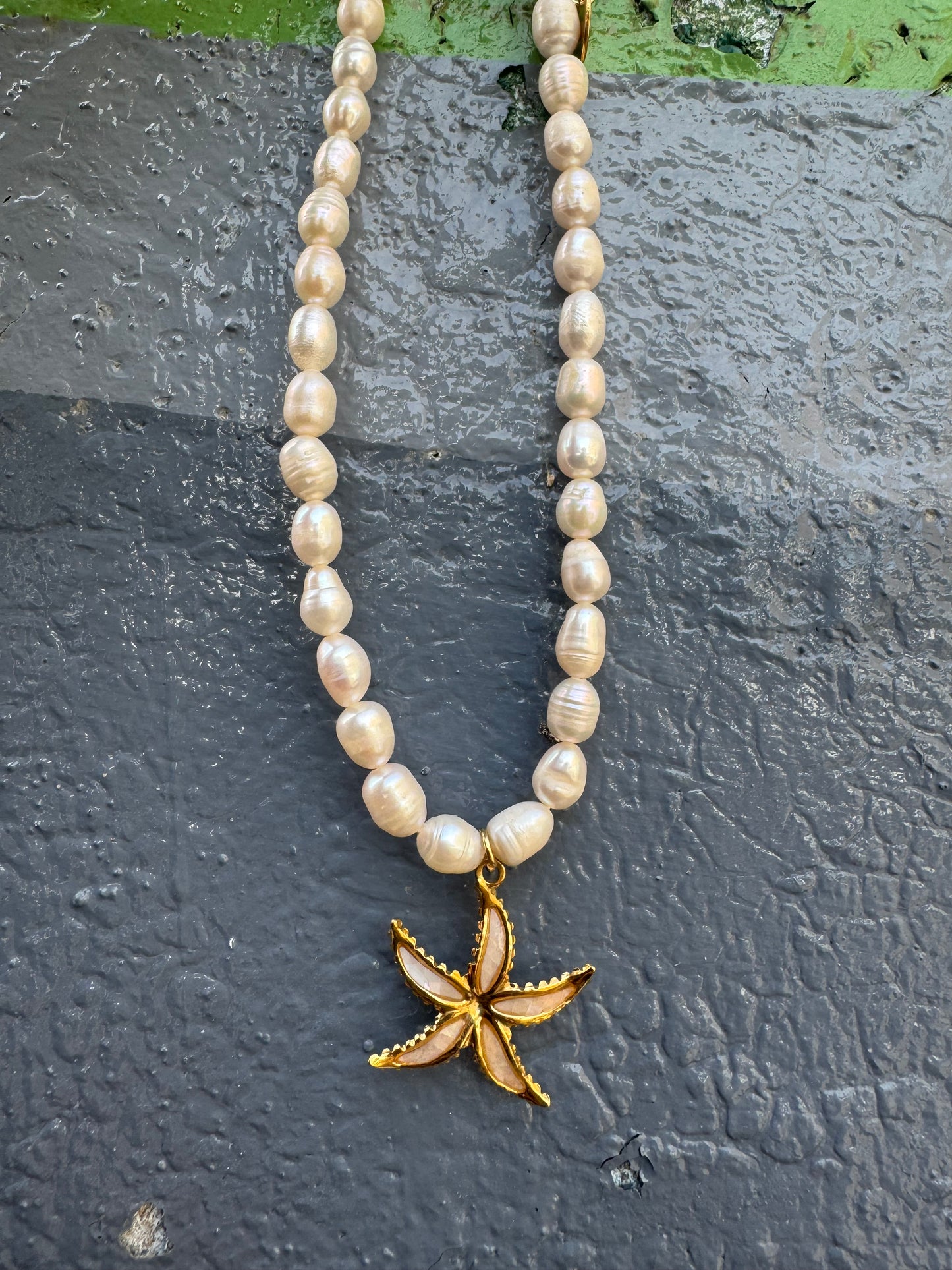 Freshwater pearl charm necklace