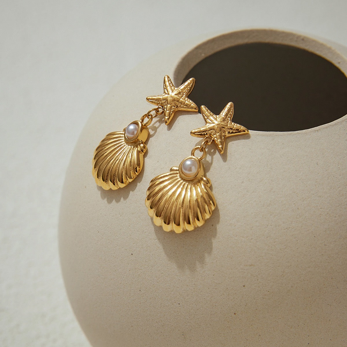 Star shell earrings