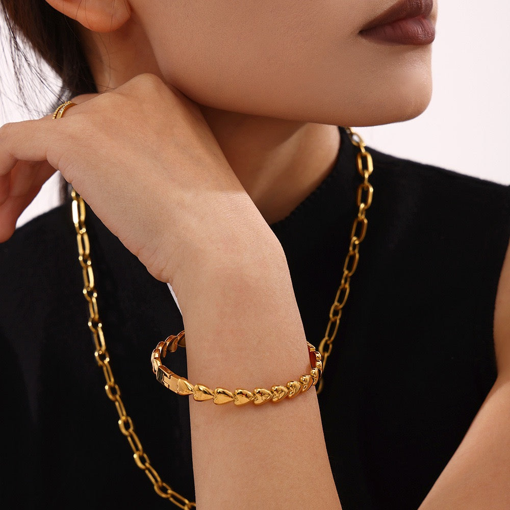 Gold heart bangle