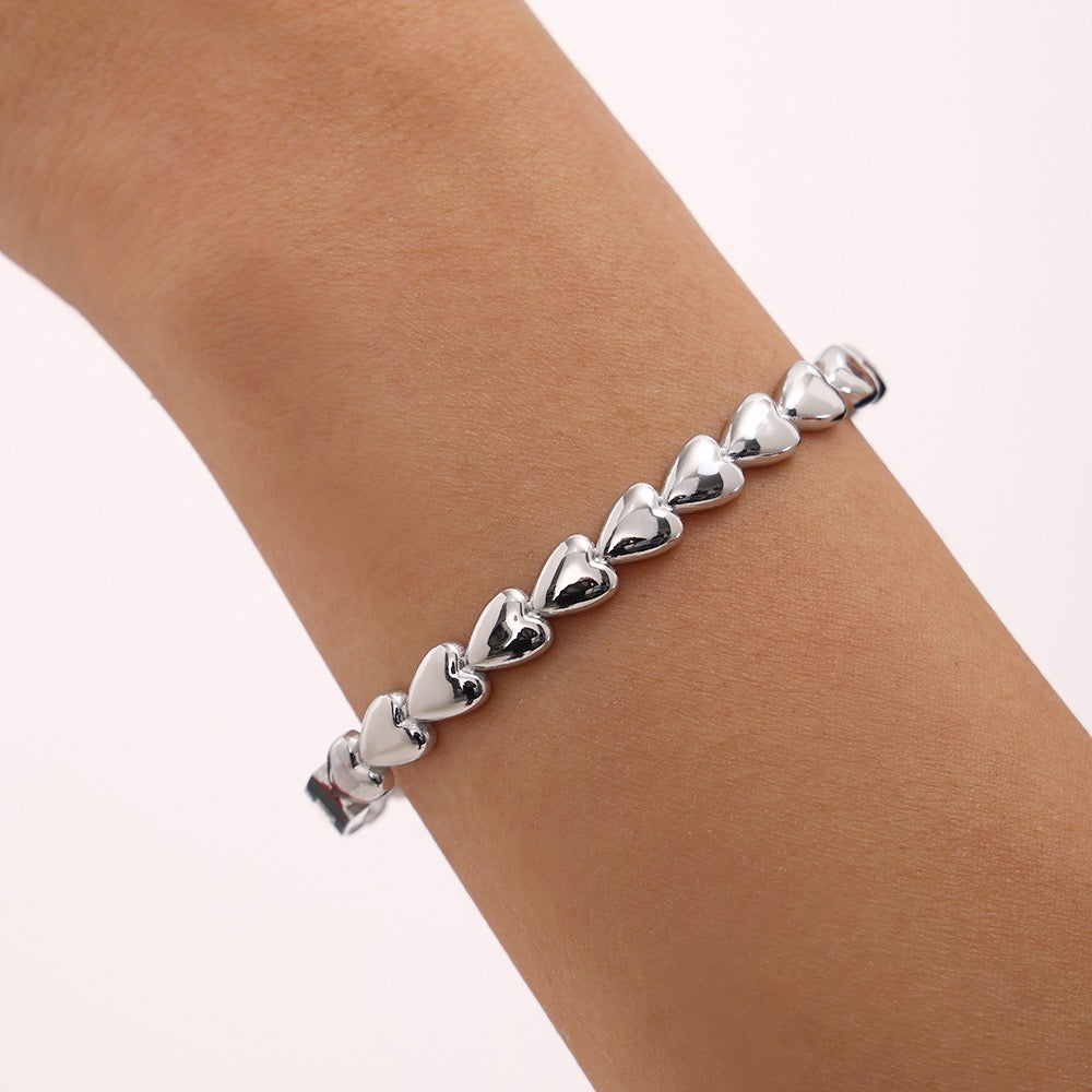 Gold heart bangle