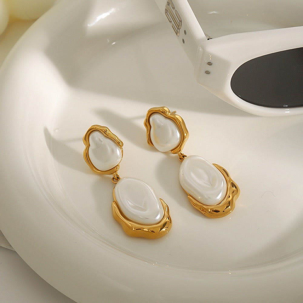 White pearly earrings