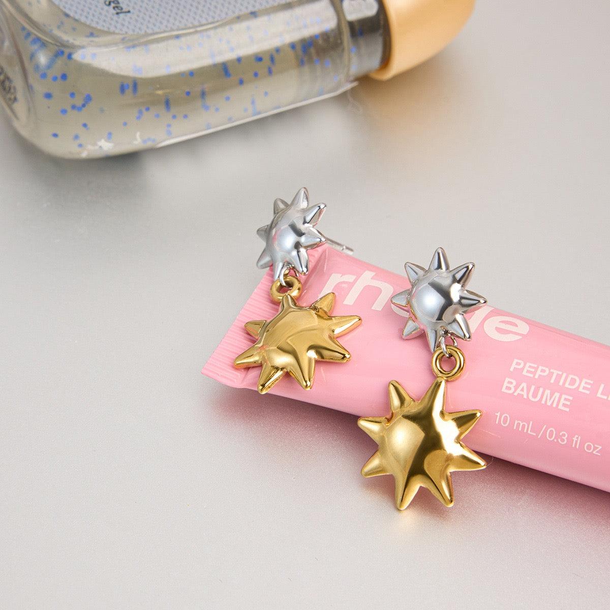 Two suns earrings