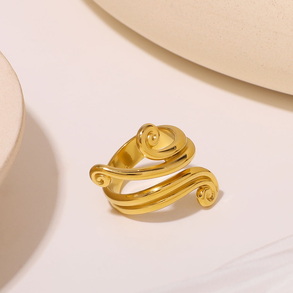Wave of swirls ring