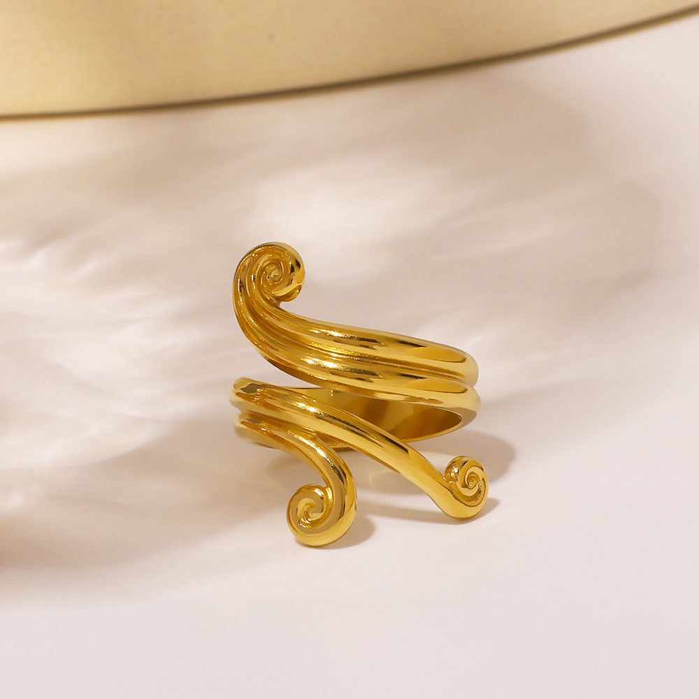 Wave of swirls ring