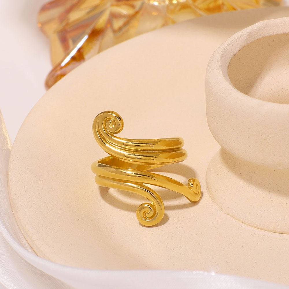 Wave of swirls ring