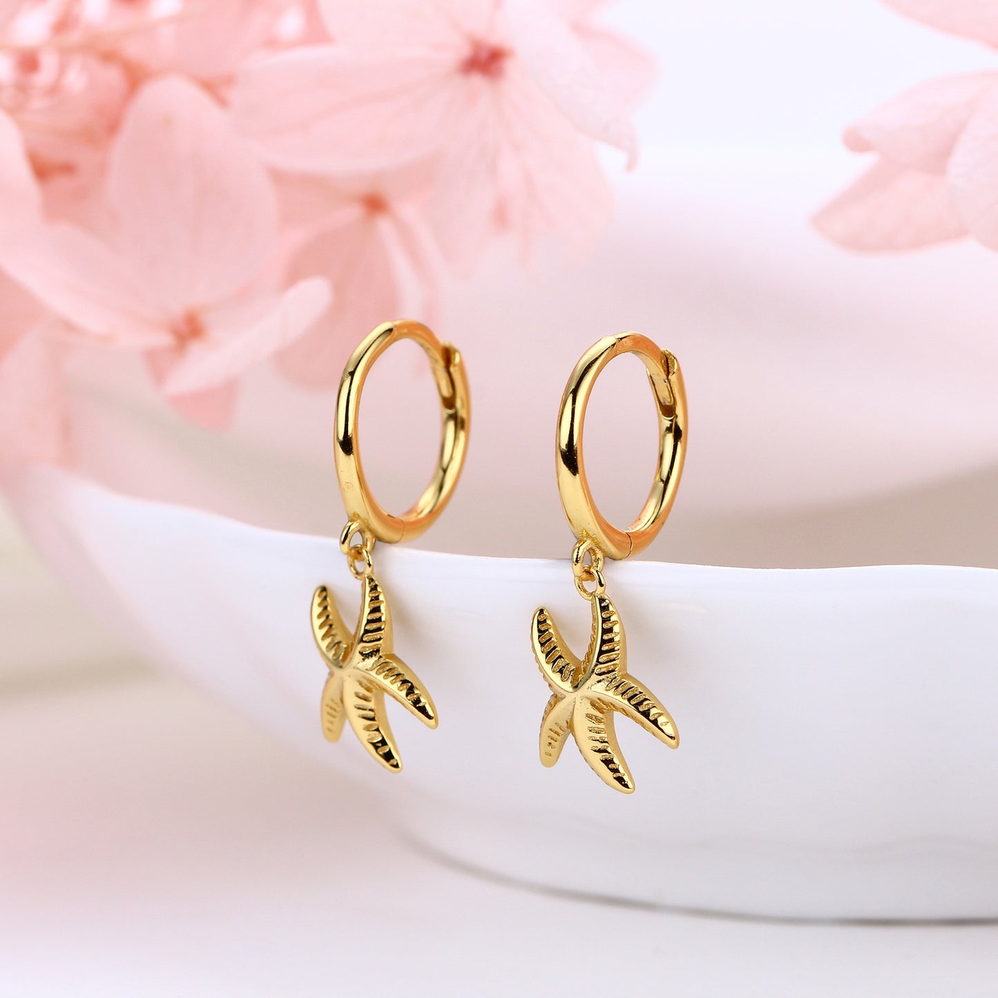 Sterling silver starfish hoops