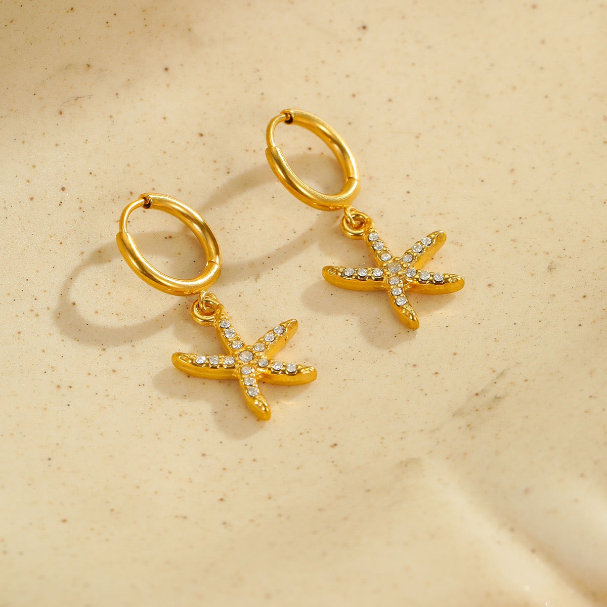 Dainty starfish hoop earrings