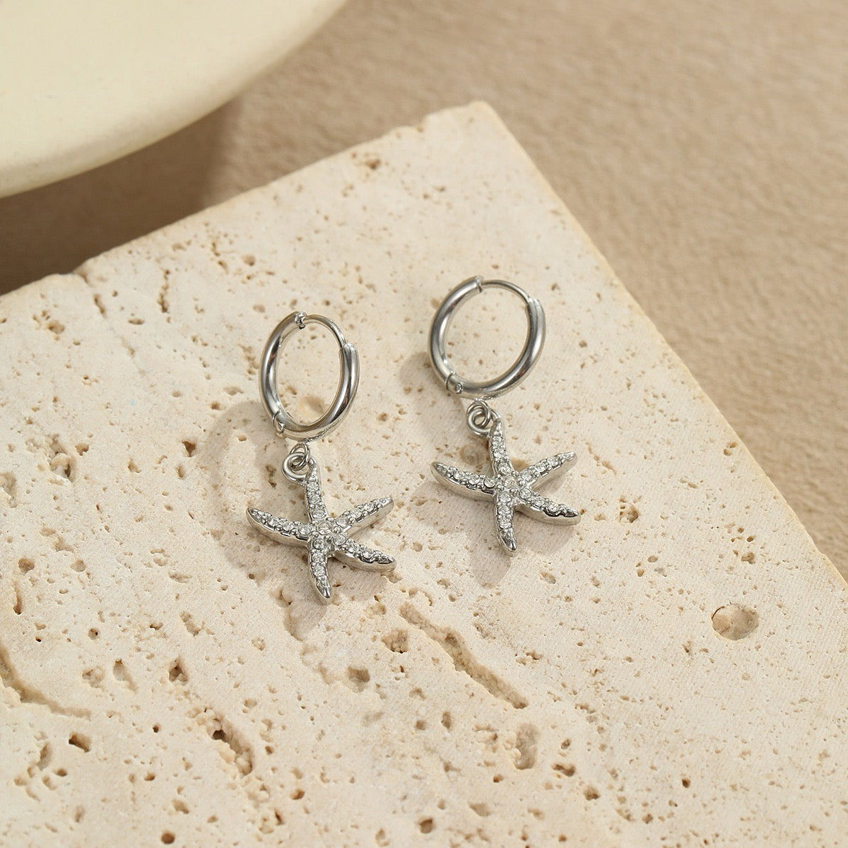 Dainty starfish hoop earrings
