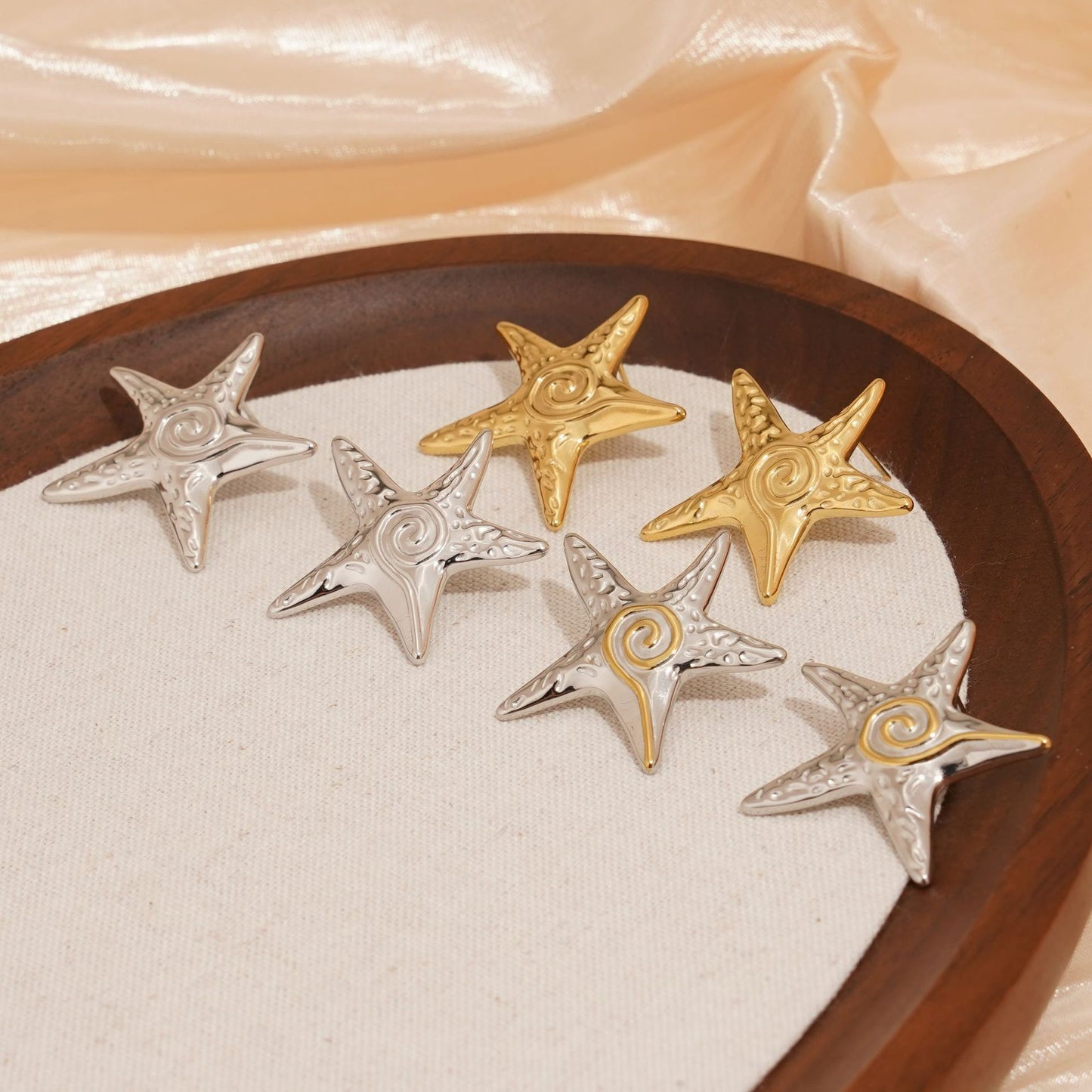 Swirl starfish earrings
