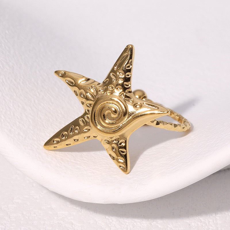 Skinny swirl starfish rings