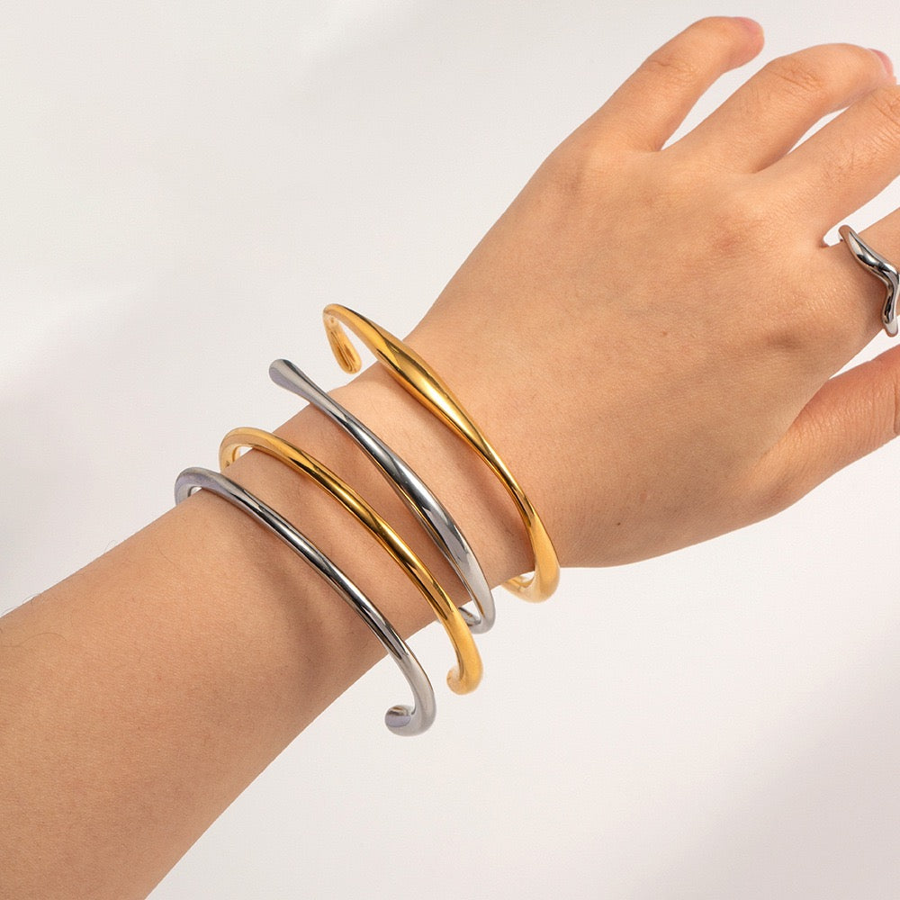 Open curvy bangles