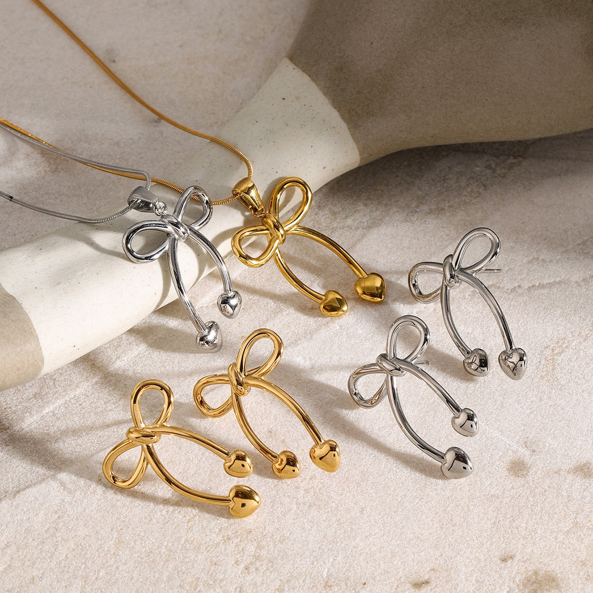 Bravery Bow heart earrings