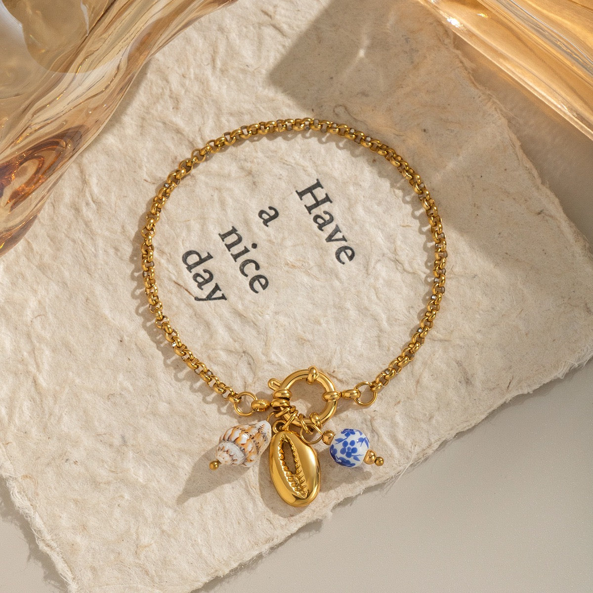 Blue shell charm bracelet