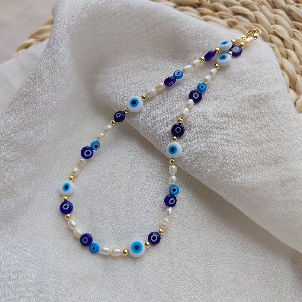 Evil eye pearl necklace