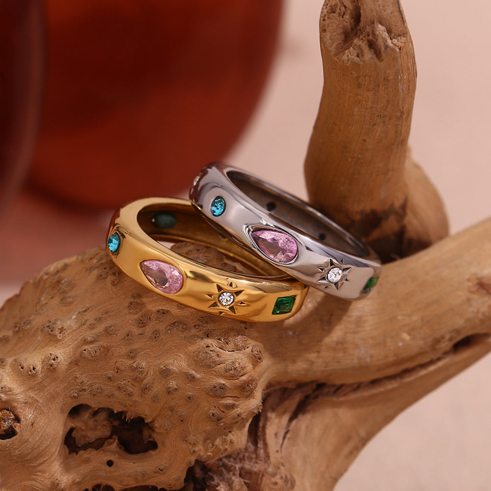 Rainbow zircon rings