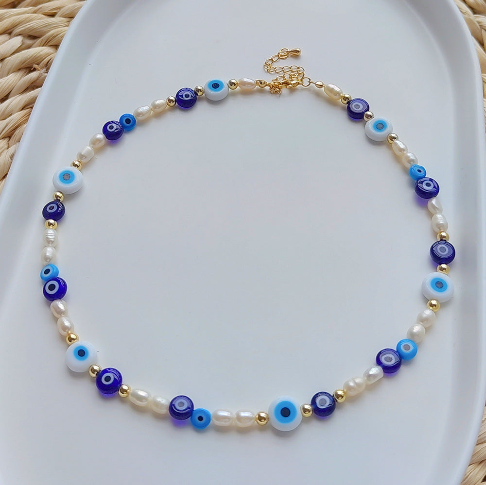 Evil eye pearl necklace