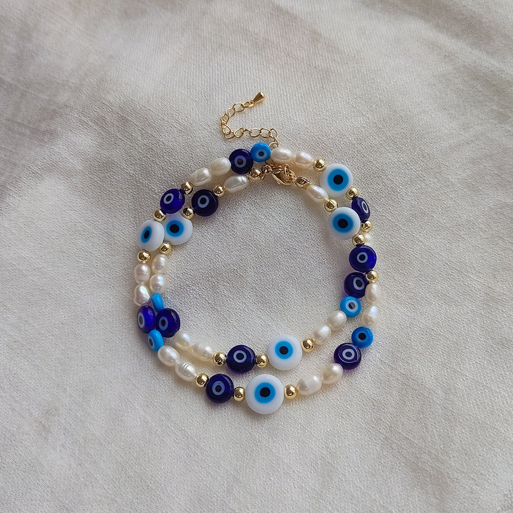 Evil eye pearl necklace