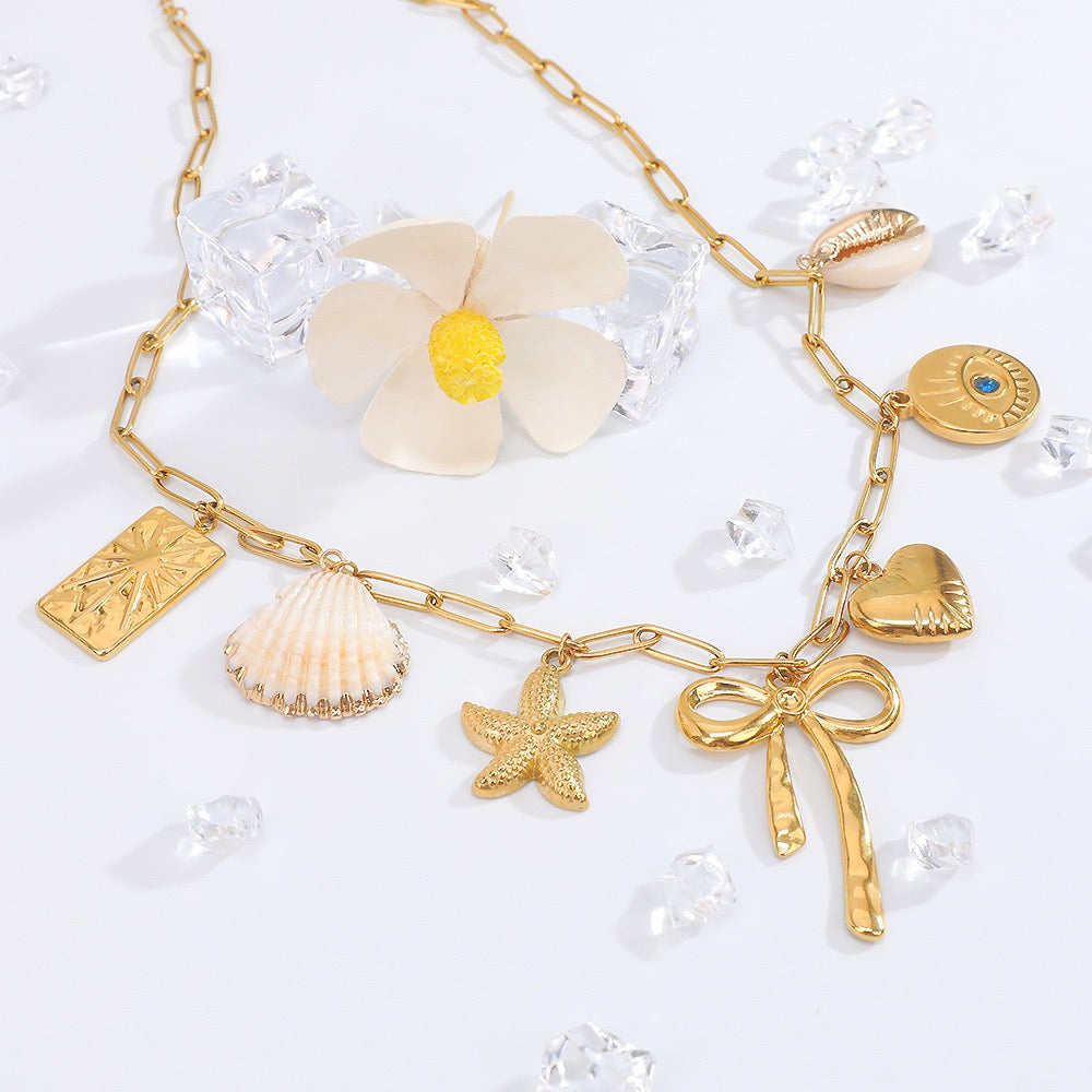 Bow shell starfish charm necklace