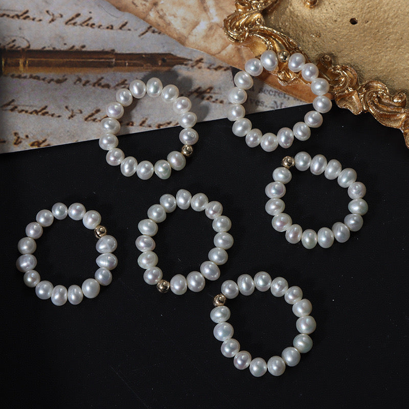 Elastic round freshwater pearls rings