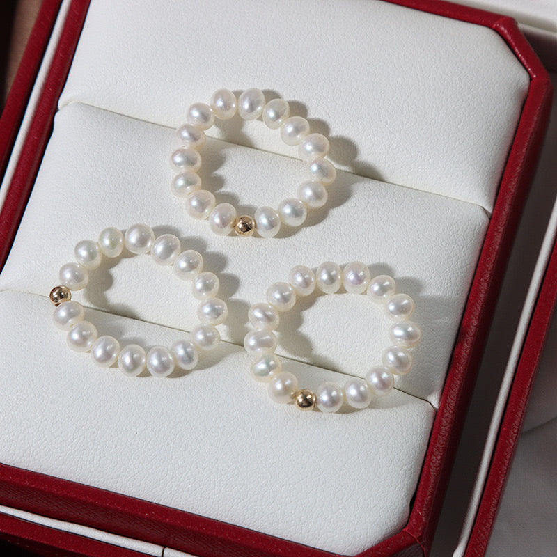 Elastic round freshwater pearls rings