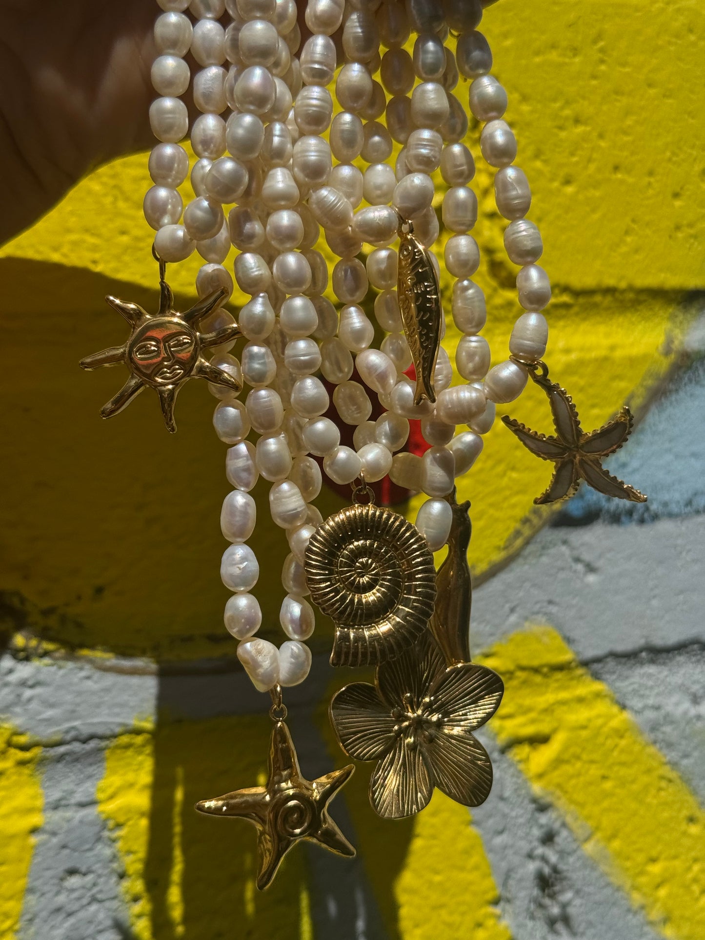 Freshwater pearl charm necklace