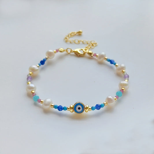 Evil eye pearl and natural stones bracelet