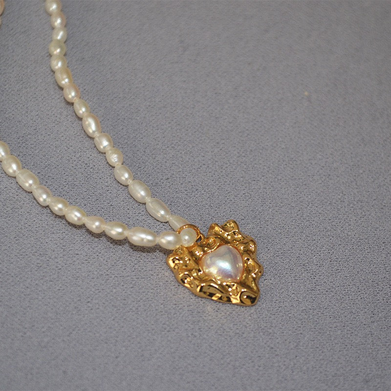 Gold heart pearl necklace