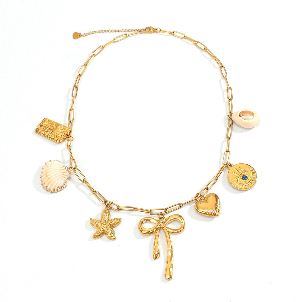 Bow shell starfish charm necklace