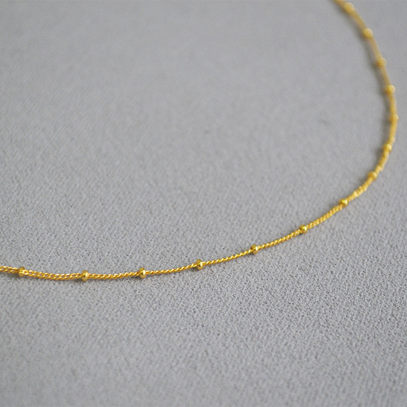 Thin beady necklace