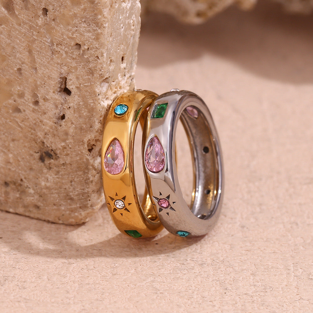 Rainbow zircon rings