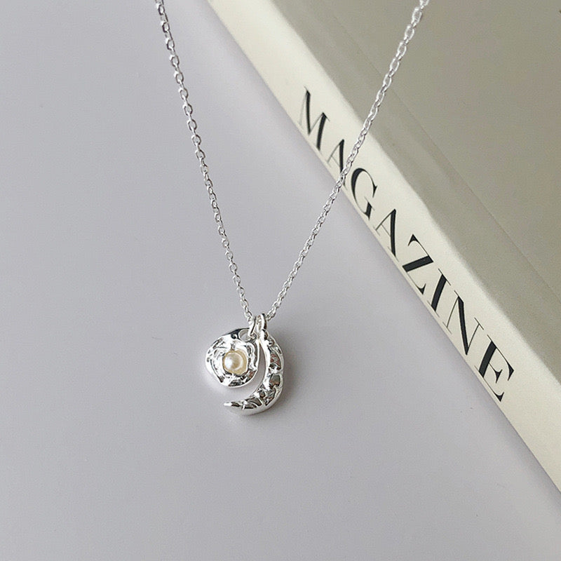 Sterling silver pearl moon and sun necklace