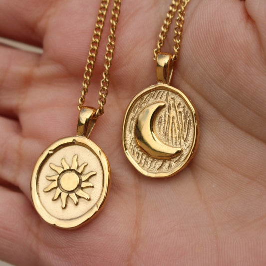 Sun and moon medallion necklace