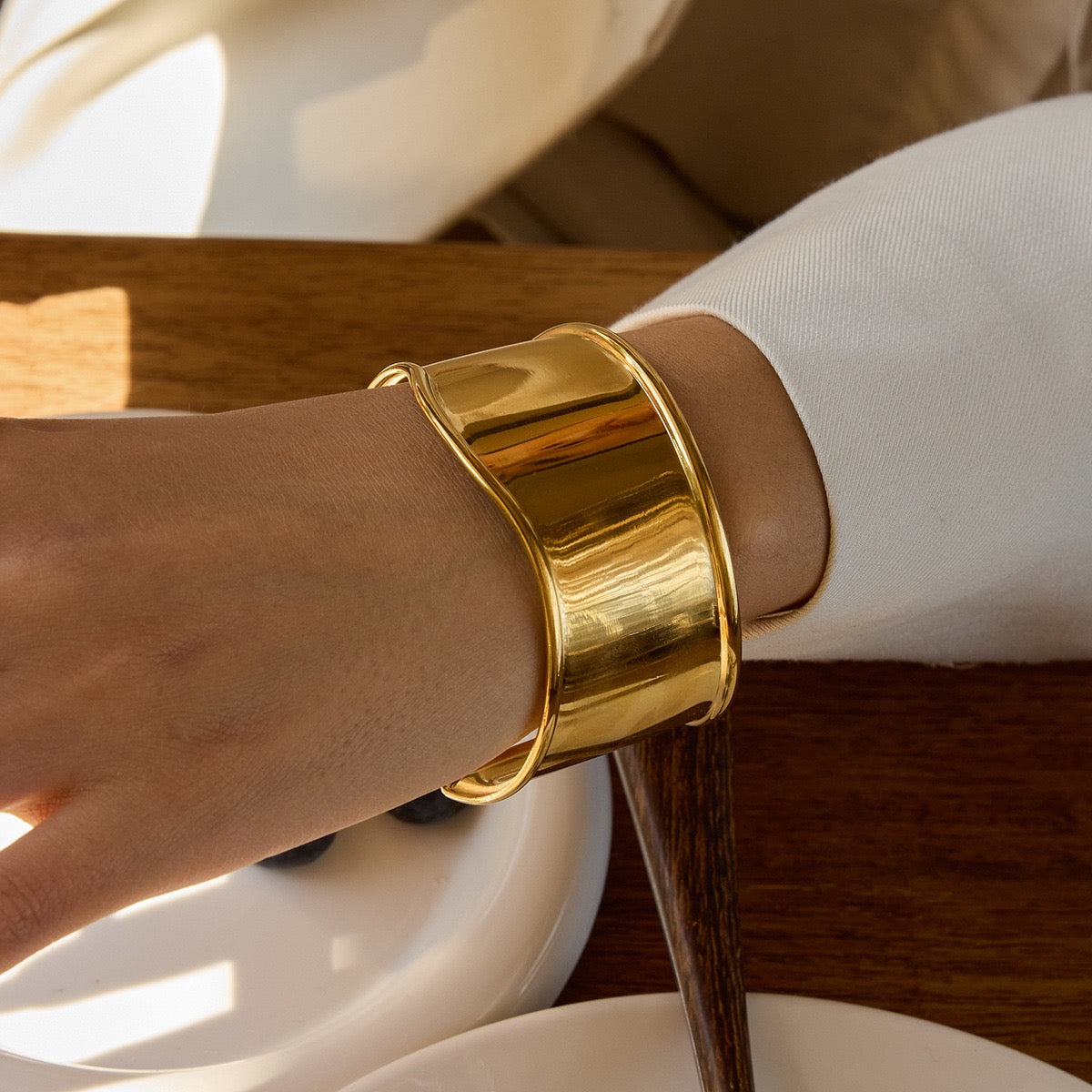 Swirl statement bangle