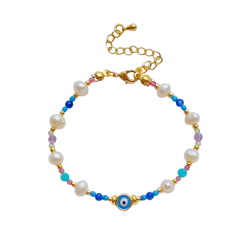 Evil eye pearl and natural stones bracelet