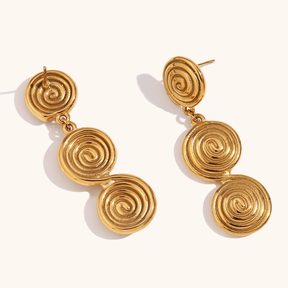 Three swirls earrings
