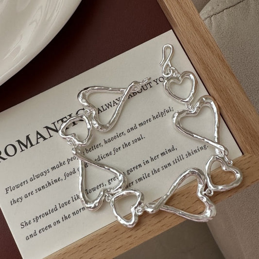 Handmade sterling silver heart bracelet