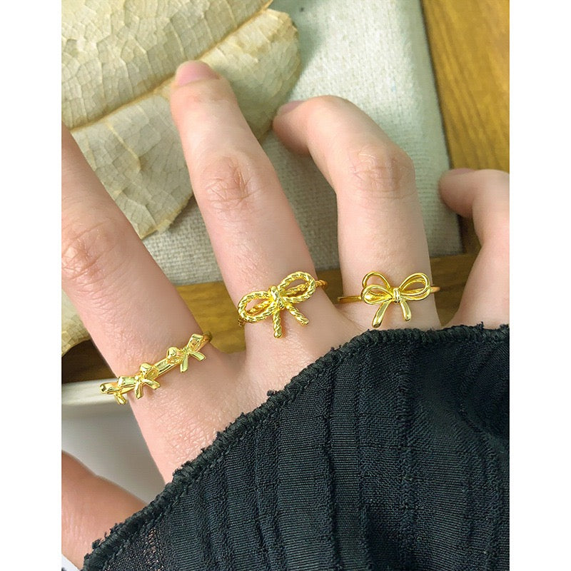Three bows ring