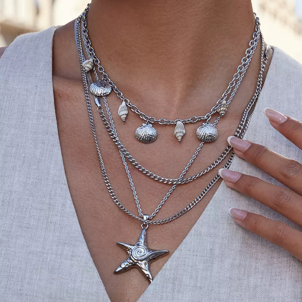 Swirl star necklace