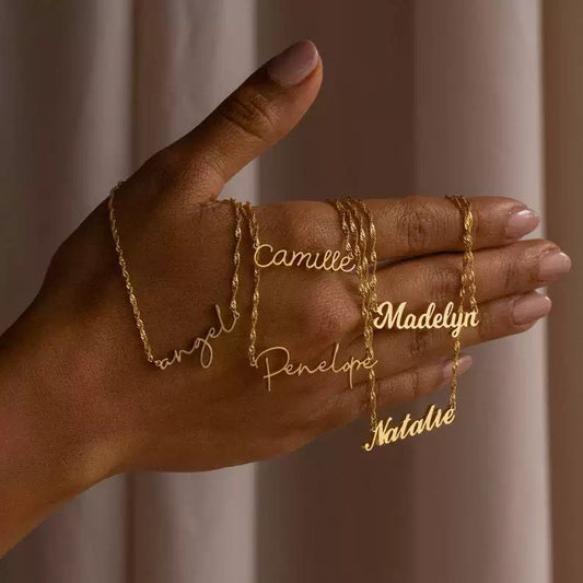 A customized name necklace stainless steel with gold plating