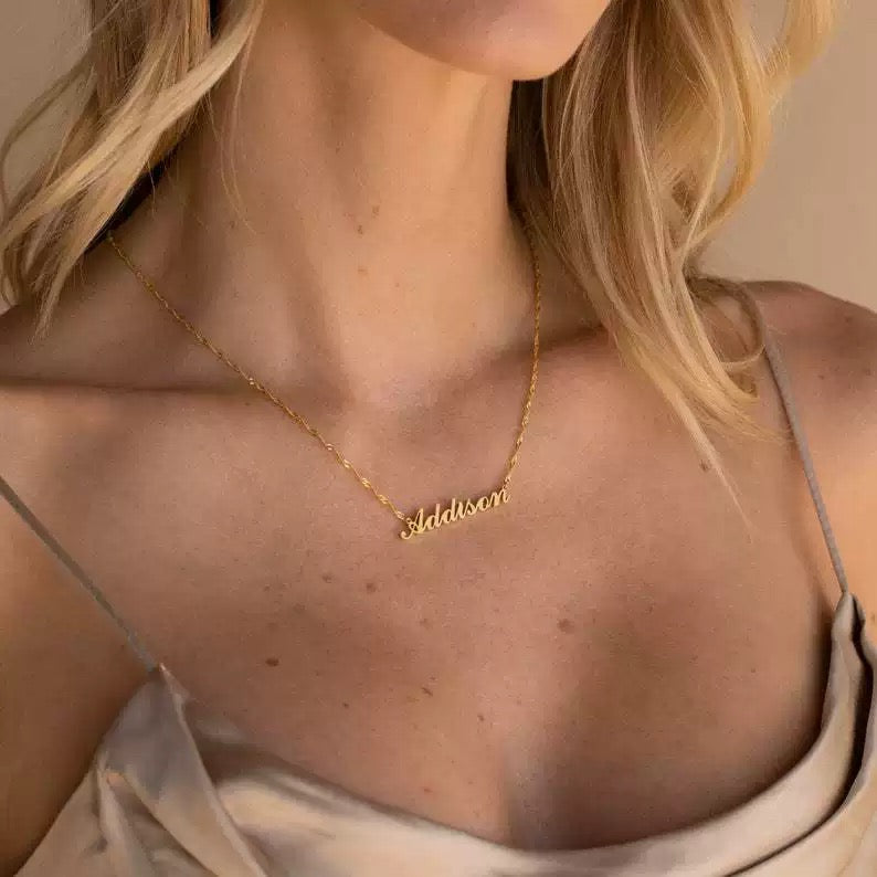 A customized name necklace stainless steel with gold plating