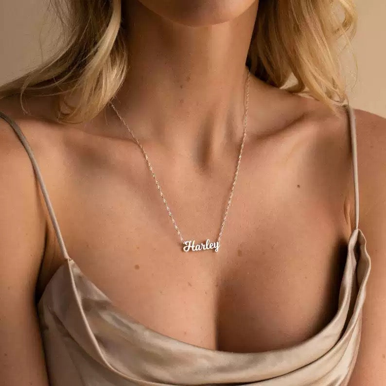 A customized name necklace stainless steel with gold plating