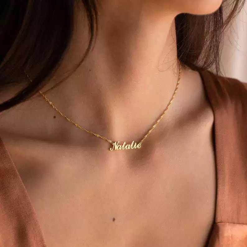 A customized name necklace stainless steel with gold plating