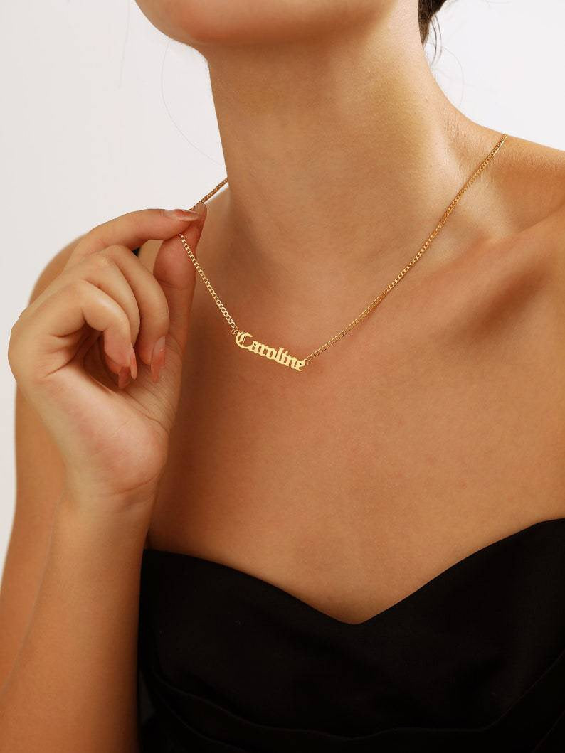 A customized name necklace stainless steel with gold plating